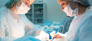 two female surgeons performing surgery