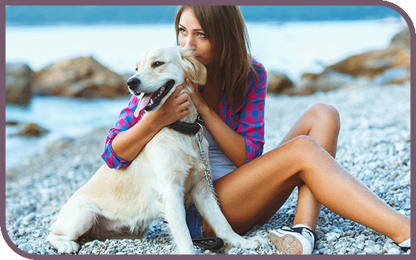 Woman hugging her dog