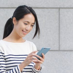woman planning on her phone