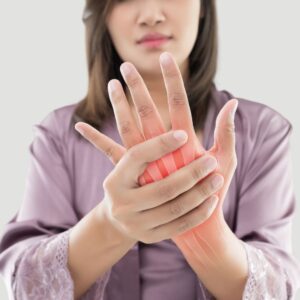 Woman grabbing her hand.