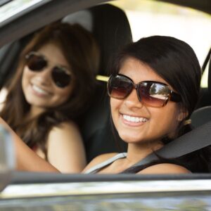 two friends in a car