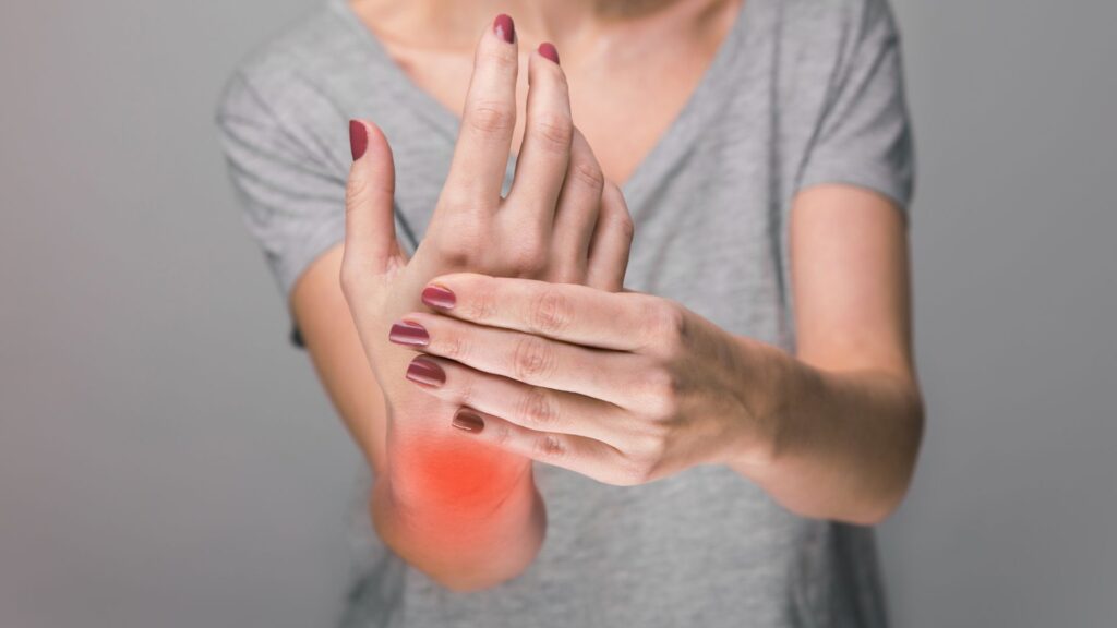 woman stretching wrist