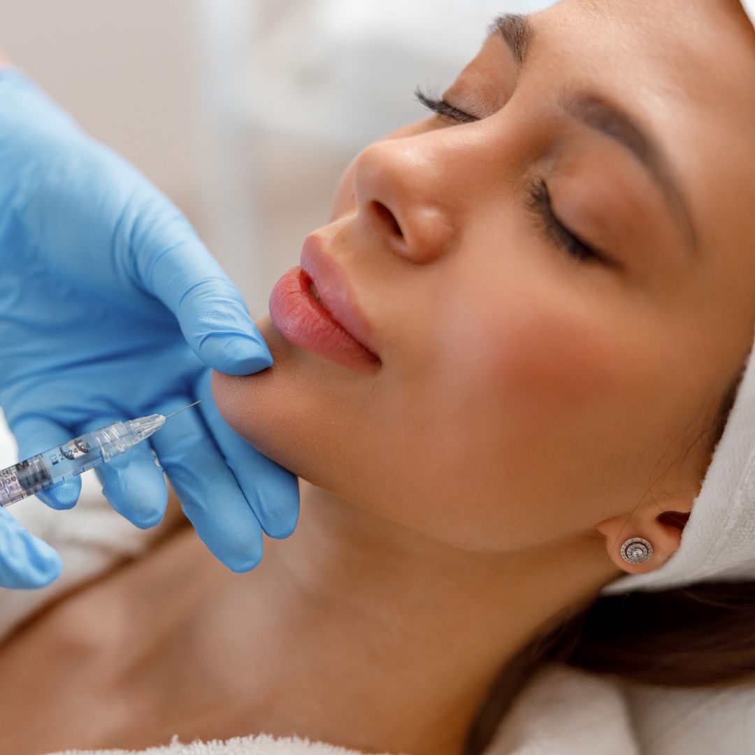 a woman getting chin work done
