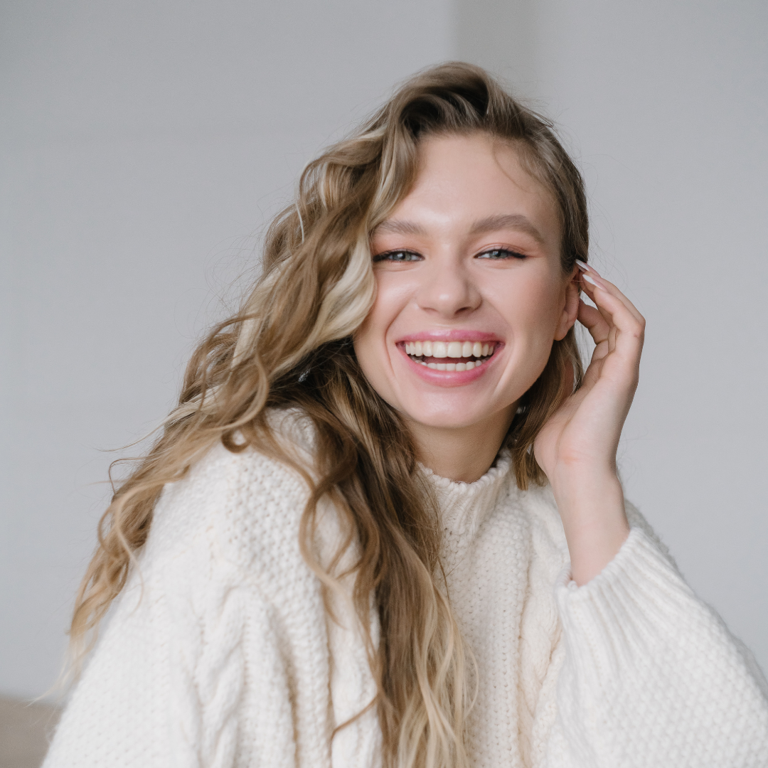 A woman happy with the cosmetic surgery 