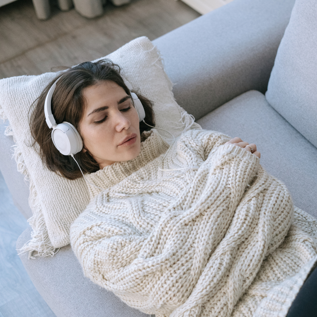 A woman resting on the couch 
