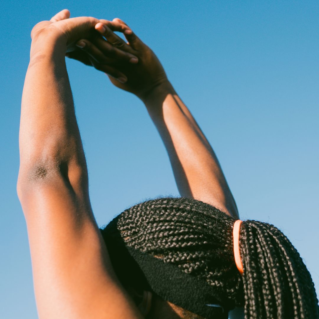woman stretching wrists