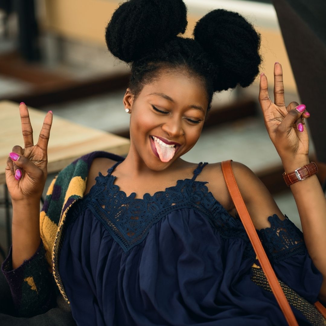 A happy, smiling woman.