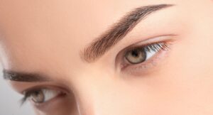 Closeup of an eyebrow lift results.