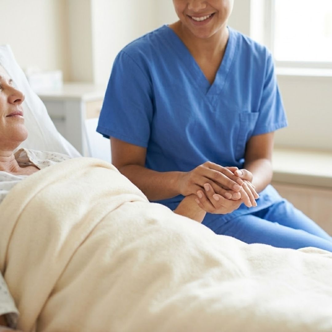 A compassionate recovery nurse provides attentive, one-on-one care as a patient gently wakes.